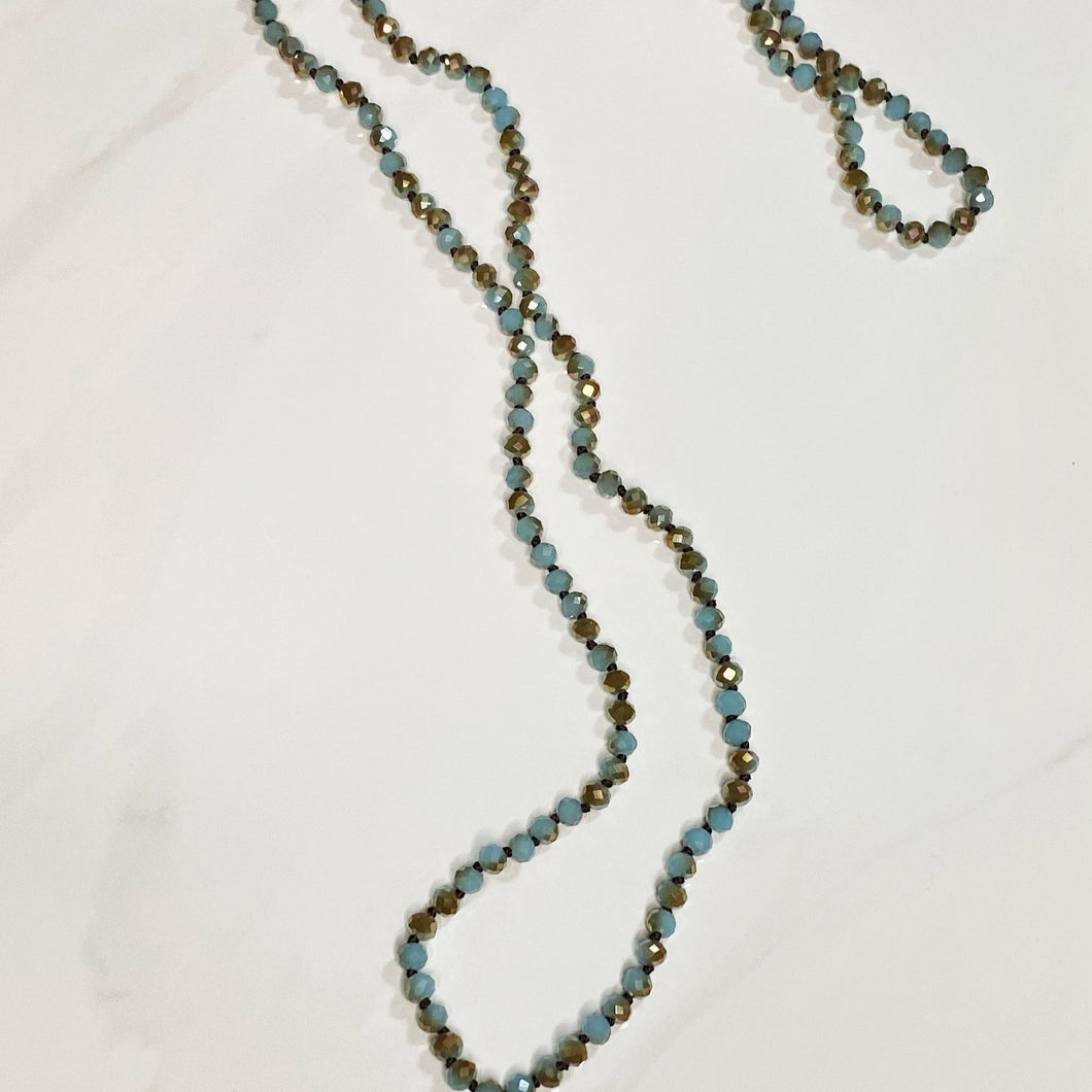 Blue And Bronze Crystal Knot Necklace